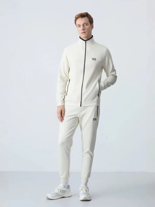 Foto van product Tommy Life Joggingpak crème