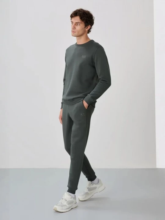 Foto van product Tommy Life Joggingpak donkergroen