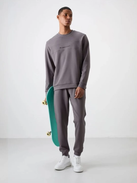 Foto van product Tommy Life Joggingpak grijs