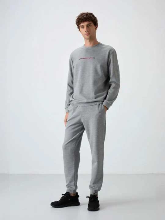 Foto van product Tommy Life Joggingpak grijs