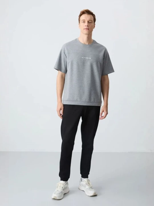 Foto van product Tommy Life Joggingpak grijs / zwart