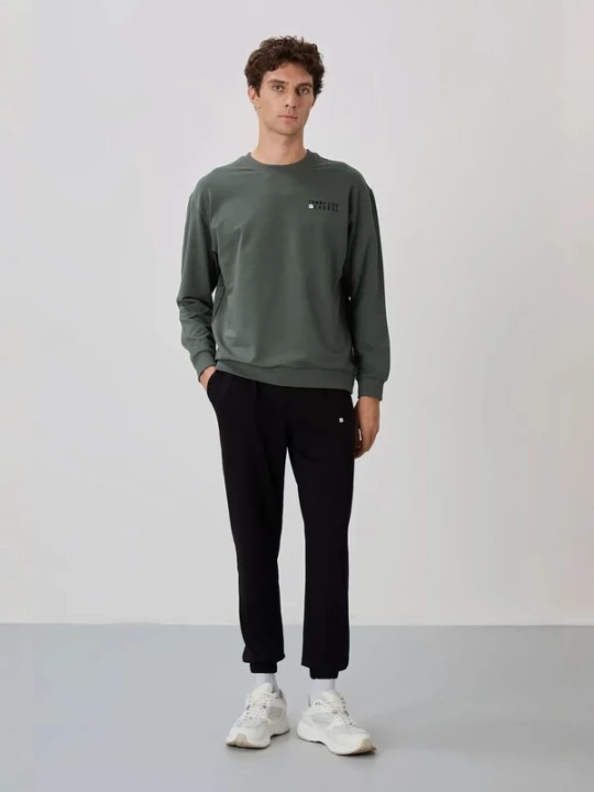 Foto van product Tommy Life Joggingpak groen
