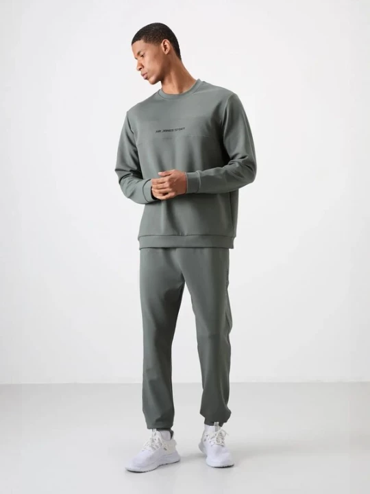 Foto van product Tommy Life Joggingpak groen