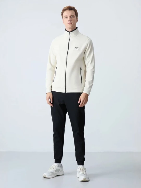 Foto van product Tommy Life Joggingpak ivoor / zwart