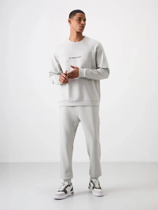 Foto van product Tommy Life Joggingpak lichtgrijs