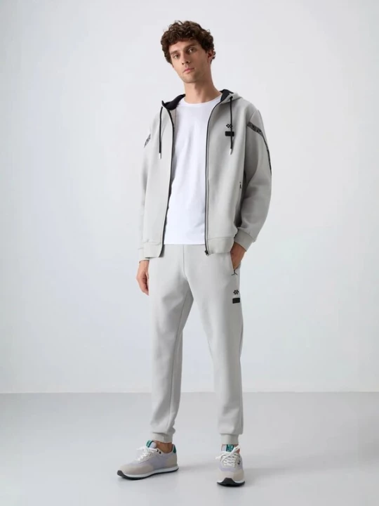 Foto van product Tommy Life Joggingpak lichtgrijs