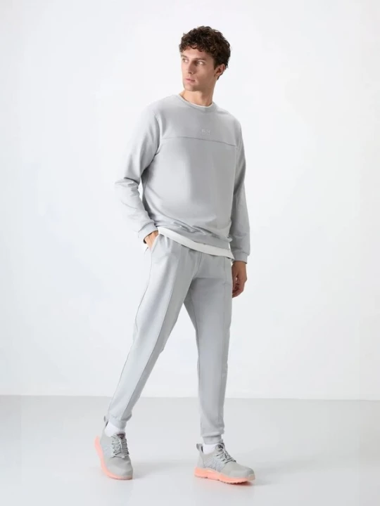 Foto van product Tommy Life Joggingpak lichtgrijs