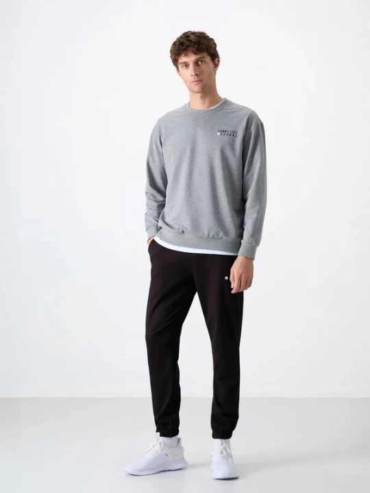 Foto van product Tommy Life Joggingpak lichtgrijs