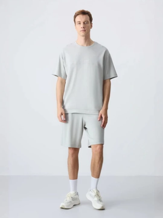 Foto van product Tommy Life Joggingpak lichtgrijs