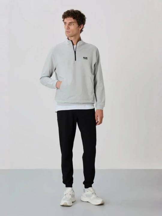 Foto van product Tommy Life Joggingpak lichtgrijs / zwart