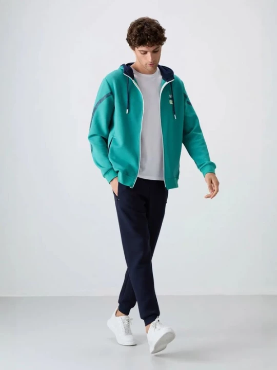 Foto van product Tommy Life Joggingpak marine / jade groen / wit