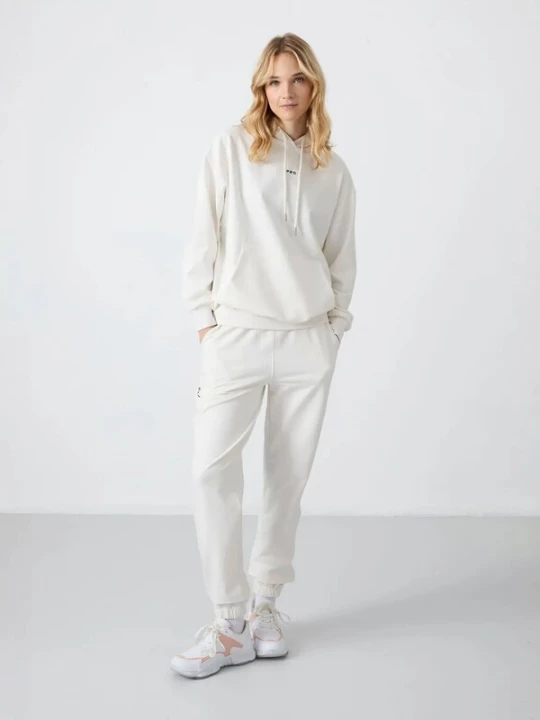 Foto van product Tommy Life Joggingpak natuurwit