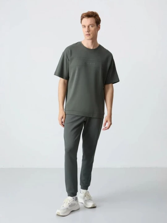 Foto van product Tommy Life Joggingpak olijfgroen