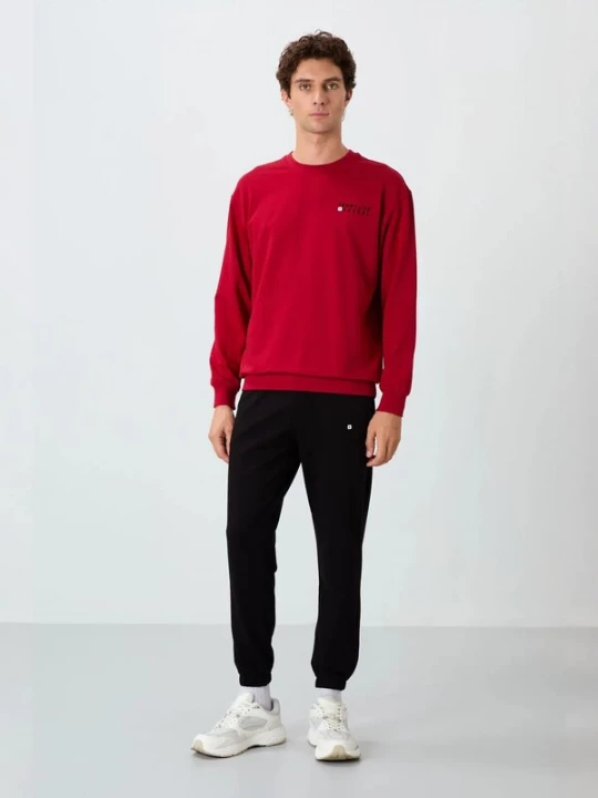 Foto van product Tommy Life Joggingpak rood / zwart
