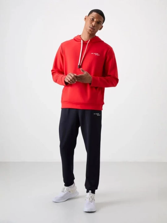 Foto van product Tommy Life Joggingpak rood / zwart