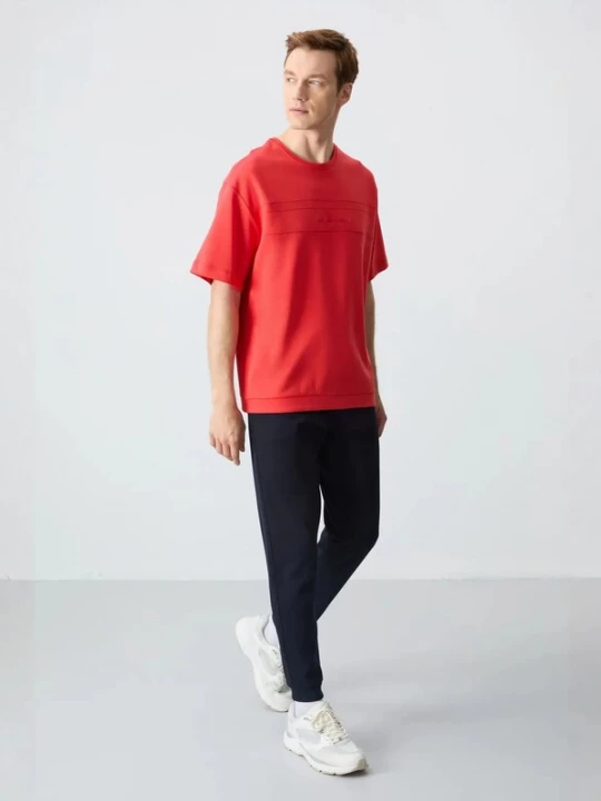 Foto van product Tommy Life Joggingpak rood / zwart