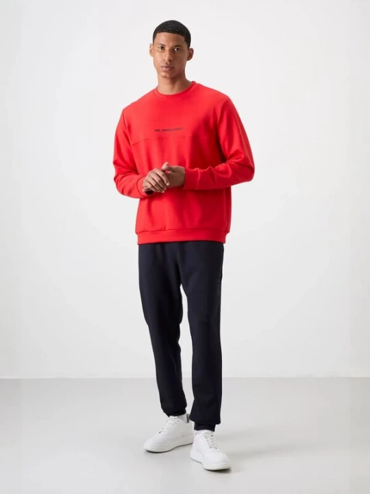 Foto van product Tommy Life Joggingpak rood / zwart
