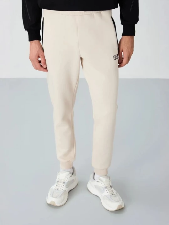 Foto van product Tommy Life Sportbroek crème / zwart