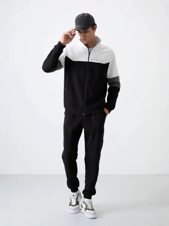 Foto van product Tommy Life Trainingspak grijs / zwart / wit