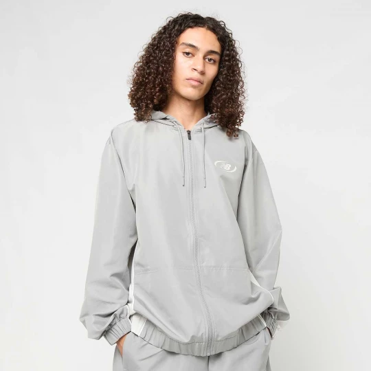 Foto van product Trackside Woven Jacket New Balance grijs