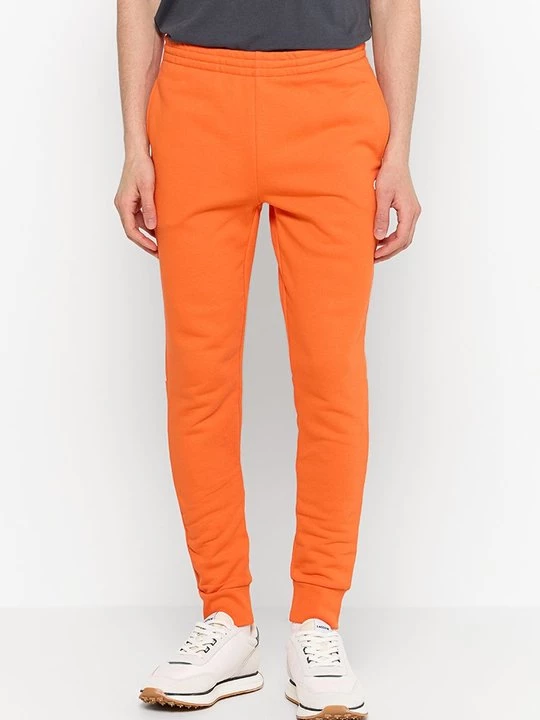Foto van product Trainingsbroek Lacoste oranje