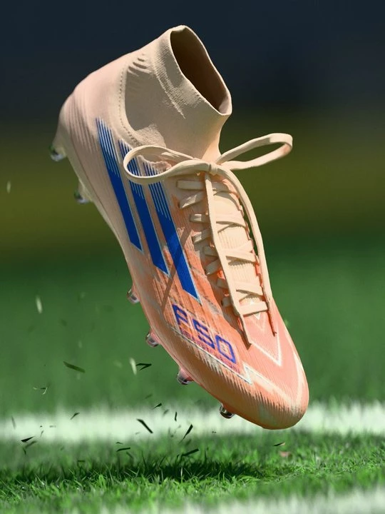 Foto van product Voetbalschoenen voor harde ondergrond Adidas oranje