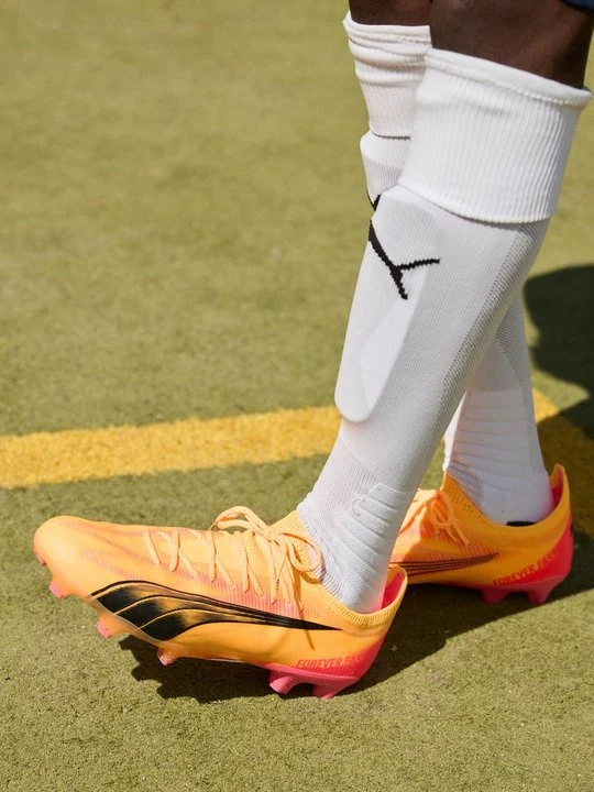 Foto van product Voetbalschoenen voor harde ondergrond Puma geel gemêleerd