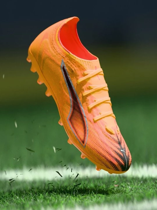 Foto van product Voetbalschoenen voor harde ondergrond Puma oranje
