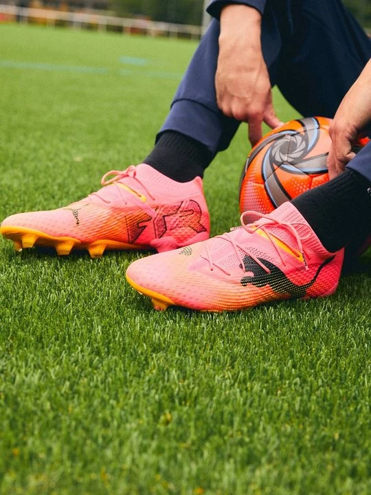 Foto van product Voetbalschoenen voor harde ondergrond Puma oranje gemêleerd