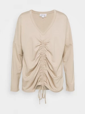 Foto van product Longsleeve Kendall + Kylie beżowy