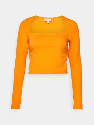 Foto van product Longsleeve Milk It oranje