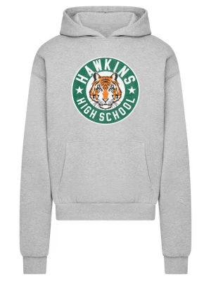 Foto van product Merchcode Sweatshirt 'Stranger Things Hawkins Tigers' grijs / groen / oranje / wit