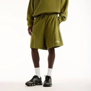 Foto van product new balance Broek 'Trackside' olijfgroen / wit