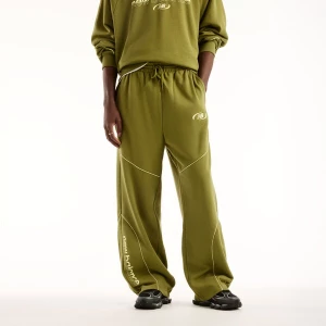 Foto van product new balance Broek 'Trackside' pasteelgeel / olijfgroen