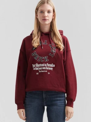 Foto van product Oversized hoodie met print op voorkant QS rood