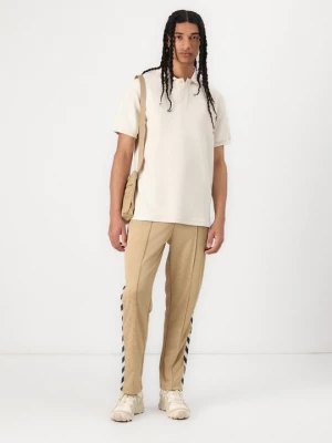 Foto van product Poloshirt Puma zandkleur