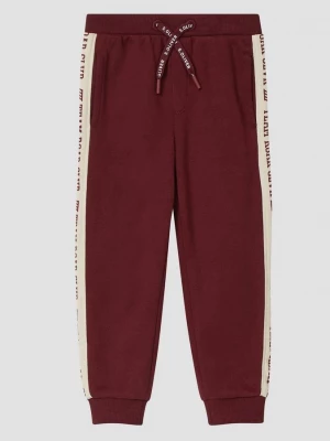 Foto van product Sweatbroek met bedrukte zijstrepen s.Oliver rood
