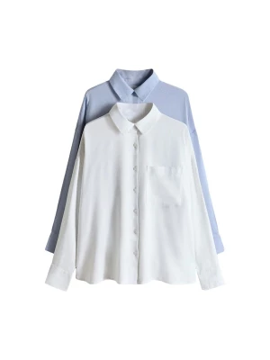 Foto van product The Set Blouse lichtblauw / wit