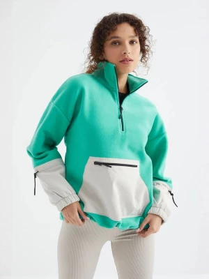 Foto van product Tommy Life Fleece jas mintgroen / wit