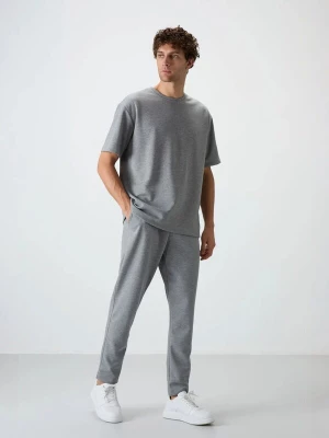 Foto van product Tommy Life Joggingpak grijs