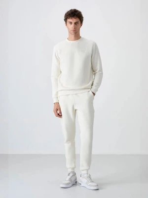 Foto van product Tommy Life Joggingpak offwhite