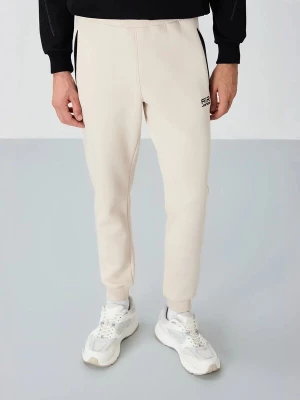 Foto van product Tommy Life Sportbroek crème / zwart