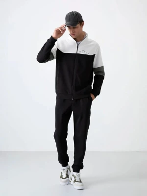 Foto van product Tommy Life Trainingspak grijs / zwart / wit