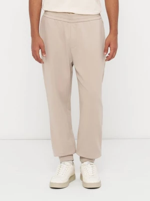Foto van product Trainingsbroek Armani Exchange koningsblauw gemêleerd