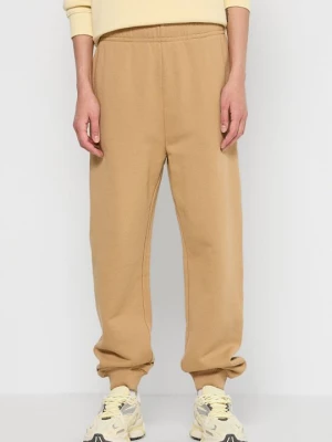 Foto van product Trainingsbroek Tommy Hilfiger okergeel