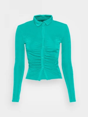 Foto van product Vest Gina Tricot turquoise
