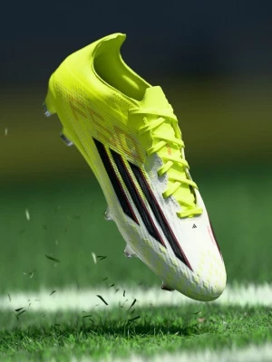 Foto van product Voetbalschoenen voor harde ondergrond Adidas geel