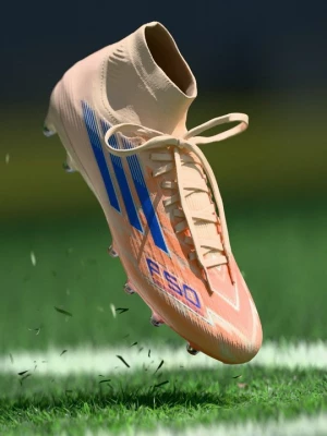 Foto van product Voetbalschoenen voor harde ondergrond Adidas oranje