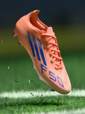 Foto van product Voetbalschoenen voor harde ondergrond Adidas oranje