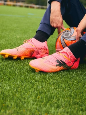 Foto van product Voetbalschoenen voor harde ondergrond Puma oranje gemêleerd